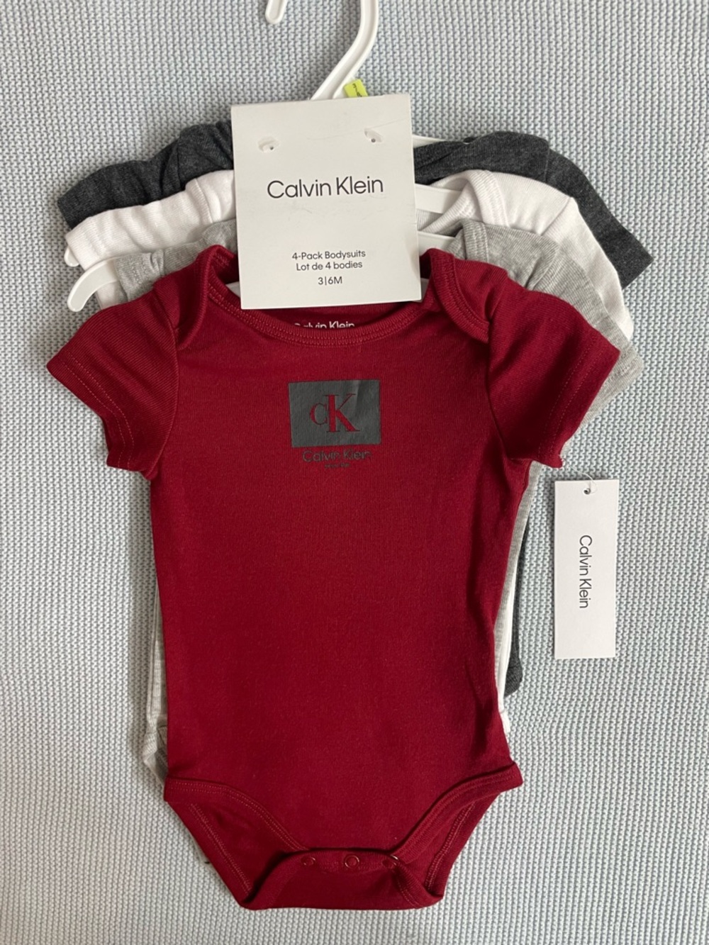 Calvin Klein  Baby  4-Pack Bodysuits Size 3-6 Months